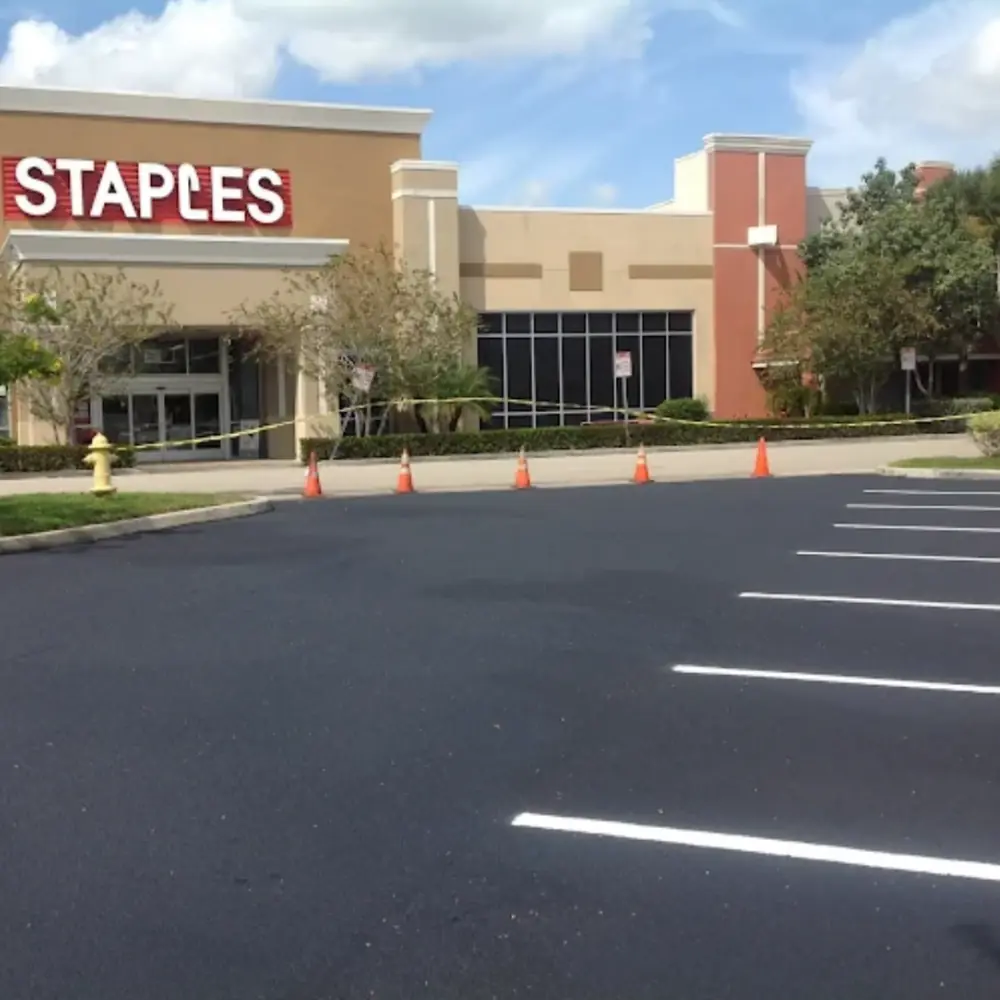 Freshly sealcoated and striped Staples retail parking lot in Southwest Florida